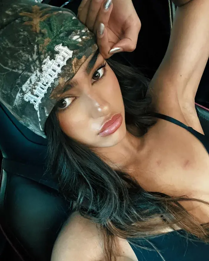 rayna vallandingham wearing cap photo